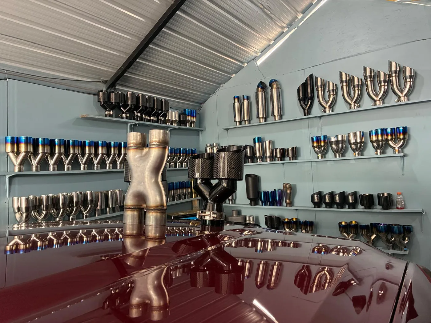 Custom muffler and exhaust tip display wall