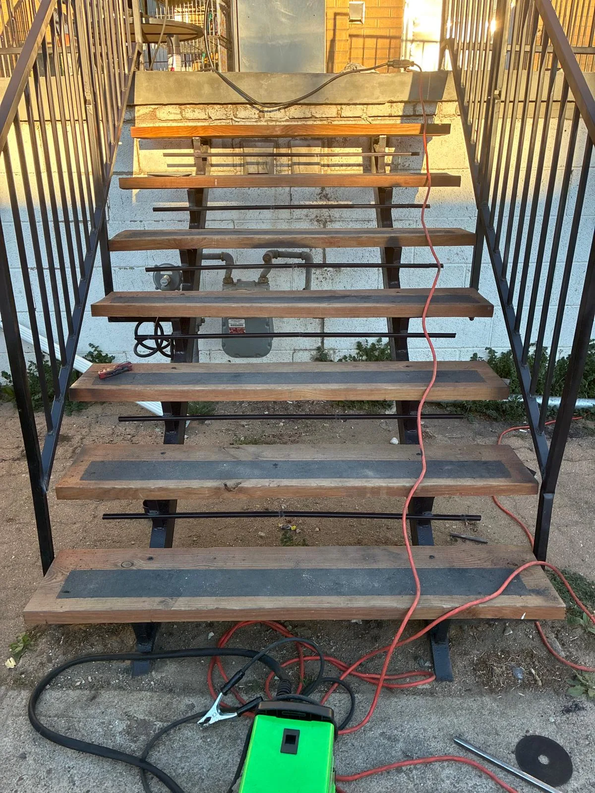 Metal staircase repair on-site in Denver